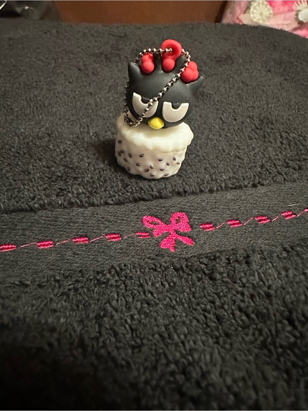 Sanrio Black and Red Batzmaru Keychain with sushi base